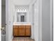 Bathroom with a vanity, sink, mirror and fixtures; a clean, functional space at 3997 Paloverde Nw Dr, Kennesaw, GA 30144