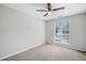 Bedroom featuring neutral walls, carpet and ceiling fan and a window at 3997 Paloverde Nw Dr, Kennesaw, GA 30144