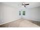 Bedroom featuring neutral walls, carpet, and windows at 3997 Paloverde Nw Dr, Kennesaw, GA 30144