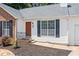 Front exterior of a brick and siding home with black shutters and a landscaped yard at 3997 Paloverde Nw Dr, Kennesaw, GA 30144