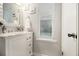 This neutral bathroom has a single sink with updated hardware, drawers, and a towel rack at 5086 N Woodbridge Trl, Stone Mountain, GA 30088