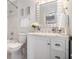 Bathroom with white marble, shower, and vanity at 5086 N Woodbridge Trl, Stone Mountain, GA 30088