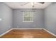 Bedroom with hardwood floors and natural light at 5086 N Woodbridge Trl, Stone Mountain, GA 30088