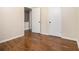Bedroom featuring hardwood floors, base molding, and neutral walls at 5086 N Woodbridge Trl, Stone Mountain, GA 30088