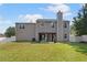The home features a spacious backyard, patio, and fenced perimeter at 1644 Royal Ives Dr, Lawrenceville, GA 30045