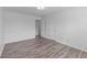 Large bedroom with luxury vinyl plank flooring and a closet at 1644 Royal Ives Dr, Lawrenceville, GA 30045