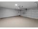 Clean, spacious garage with ample storage and a white door at 1644 Royal Ives Dr, Lawrenceville, GA 30045