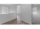 Hallway with view into a bedroom at 1644 Royal Ives Dr, Lawrenceville, GA 30045