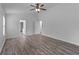 Large main bedroom with vaulted ceiling, vinyl plank flooring, and an ensuite bathroom at 1644 Royal Ives Dr, Lawrenceville, GA 30045