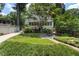 Charming backyard with well manicured lawn and landscaping, including a quaint patio set at 1772 Ridgewood Ne Dr, Atlanta, GA 30307