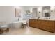 Elegant bathroom featuring a freestanding tub, a double vanity, and ample counter space at 1772 Ridgewood Ne Dr, Atlanta, GA 30307