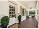 Covered front porch featuring seating area and charming architectural details at 1772 Ridgewood Ne Dr, Atlanta, GA 30307