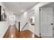 Hallway featuring hardwood floors and access to various rooms in the home at 1772 Ridgewood Ne Dr, Atlanta, GA 30307