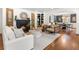 Bright living room featuring a fireplace, hardwood floors, and modern decor at 1772 Ridgewood Ne Dr, Atlanta, GA 30307