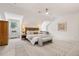 Spacious bedroom with seating area and neutral decor at 1772 Ridgewood Ne Dr, Atlanta, GA 30307