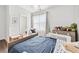 bedroom with a comfortable bed, natural light from the window and decoratively adorned with toys at 310 Braeden Way, Alpharetta, GA 30009