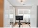 Small but functional home exercise room with mirrored walls and modern exercise equipment at 310 Braeden Way, Alpharetta, GA 30009