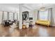 Open floor plan combining living, office and Gathering room, complete with modern finishes and hardwood floors at 310 Braeden Way, Alpharetta, GA 30009