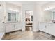 Light and bright main bathroom with double vanity and marble countertops with bedroom access at 310 Braeden Way, Alpharetta, GA 30009