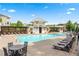 Community pool with ample seating and lounge chairs for relaxation at 310 Braeden Way, Alpharetta, GA 30009