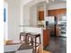 Open kitchen with stone counters, stainless steel appliances, and bar stool seating at 3445 Stratford Ne Rd # 2409, Atlanta, GA 30326