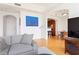 Spacious living room with hardwood floors and neutral decor, and open to the kitchen and dining areas at 3445 Stratford Ne Rd # 2409, Atlanta, GA 30326