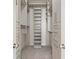 Spacious walk-in closet with built-in shelving and drawers for ample storage at 3445 Stratford Ne Rd # 2409, Atlanta, GA 30326