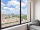 Gorgeous window view of the city and skyline from the comfort of the living room at 3445 Stratford Ne Rd # 2409, Atlanta, GA 30326