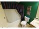 Standard bathroom with shower/tub combination and neutral-toned vanity at 3545 Manchester Dr, Lawrenceville, GA 30044