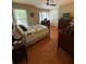 Comfortable bedroom with wood floors, natural light, and closet at 3545 Manchester Dr, Lawrenceville, GA 30044