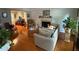 Living room featuring hardwood floors, fireplace, and view to another room, creating a warm and inviting atmosphere at 3545 Manchester Dr, Lawrenceville, GA 30044