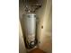 The water heater is located in a closet with a door at 3545 Manchester Dr, Lawrenceville, GA 30044