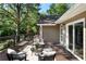 Cozy outdoor deck with comfortable seating and a view of the surrounding greenery at 528 Pumpkinvine Rd, Acworth, GA 30101