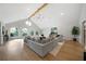 Spacious living room features vaulted ceilings, hardwood floors, and ample seating at 528 Pumpkinvine Rd, Acworth, GA 30101