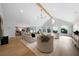 Bright living room boasts vaulted ceilings, hardwood floors, and lots of natural light at 528 Pumpkinvine Rd, Acworth, GA 30101