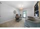 Bright office space with desk and art. Includes an exit door to the outside at 528 Pumpkinvine Rd, Acworth, GA 30101