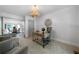 Bright office space with chandelier and desk, connected to the dining room at 528 Pumpkinvine Rd, Acworth, GA 30101