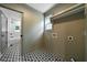Spacious walk-in closet with decorative floor tile and shelf at 528 Pumpkinvine Rd, Acworth, GA 30101