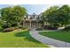 Beautifully landscaped property with a charming exterior and inviting walkway at 6755 Waveland Dr, Cumming, GA 30040
