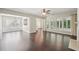 Open concept living room with hardwood floors and great natural light at 6755 Waveland Dr, Cumming, GA 30040