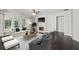 Bright living room with hardwood floors, fireplace, and comfortable seating at 6755 Waveland Dr, Cumming, GA 30040