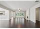 Bright living room with hardwood floors, fireplace, and plenty of natural light at 6755 Waveland Dr, Cumming, GA 30040