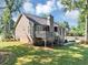 Charming home featuring a wooden deck, stairs, and a spacious yard perfect for outdoor enjoyment and entertaining at 70 Maplewood Ln, Acworth, GA 30101