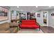 Cozy finished basement with a futon, laundry area, and access to the bathroom at 70 Maplewood Ln, Acworth, GA 30101