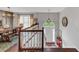 View of the foyer with open staircase, dining room, and front door entry at 70 Maplewood Ln, Acworth, GA 30101