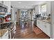 Updated kitchen with breakfast nook, stainless appliances, and granite counters at 70 Maplewood Ln, Acworth, GA 30101
