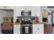 Updated kitchen with gas range and granite counters with open floor plan at 70 Maplewood Ln, Acworth, GA 30101