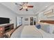 Spacious main bedroom features a vaulted ceiling, fan, and ensuite bath with walk-in closet at 70 Maplewood Ln, Acworth, GA 30101