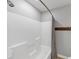 Close-up of a bright, clean shower featuring a neutral-toned shower curtain and shower head at 70 Maplewood Ln, Acworth, GA 30101