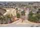 An aerial view of homes nestled in a golf course community with lush greenery at 1037 Windermere Xing, Cumming, GA 30041